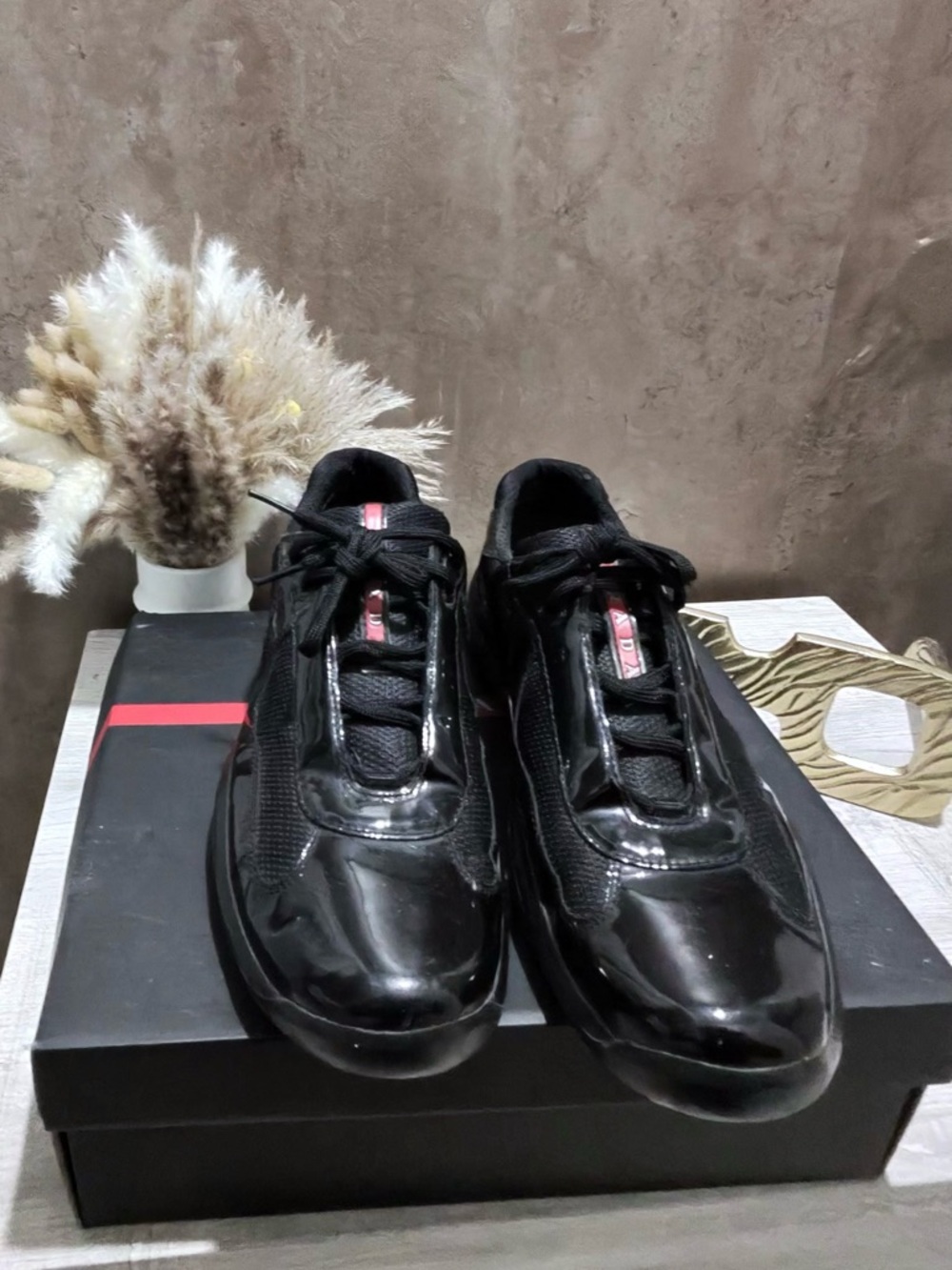 Prada Men's Black Low-Top Patent Sneakers with Red Accent